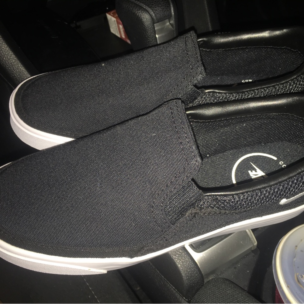 Woman’s slide on in Nikes size 6